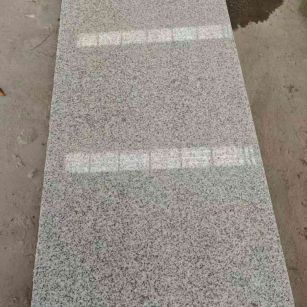 商丘芝麻白光面毛板