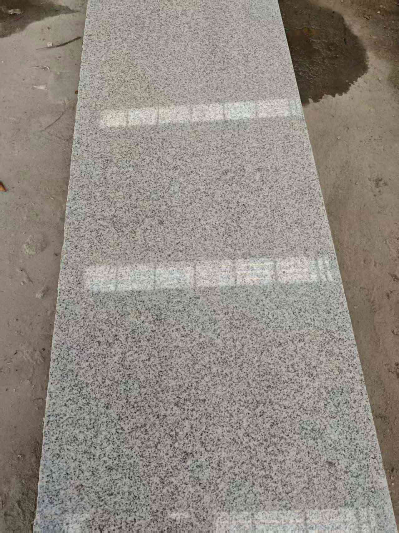 商丘芝麻白光面毛板